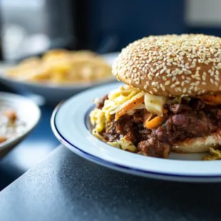 a hamburger and a bowl of soup