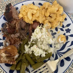Pulled pork, green beans, Mac and cheese, coleslaw, &amp; bbq bread.