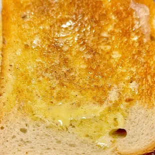 a slice of toasted bread on a plate