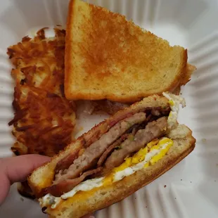 Texas Styled Breakfast Sandwich (sausage &amp; bacon) with hashbrowns