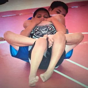 No GI Tournament. Hooks are in. Rear Naked Choke Win!!