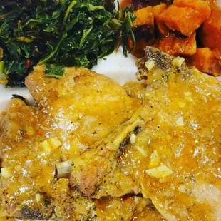 Smothered Pork Chop Plate, greens, sweet potatoes