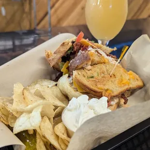Chipotle Turkey Club sandwich featuring jalapeno cheddar bread, side of homemade French onion dip, with shandy style beer, Sun Showers.