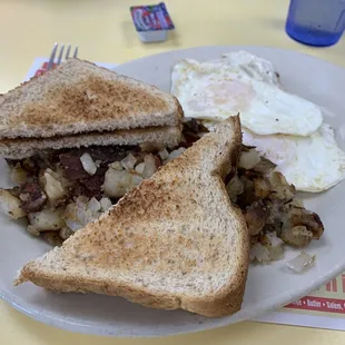 Jumbo reveille: two eggs, toast , hash browns and choice of meat. Dirt cheap!