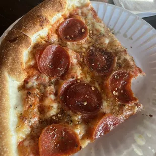 a slice of pepperoni pizza