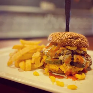 a plate of fries and a sandwich