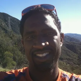 J G.