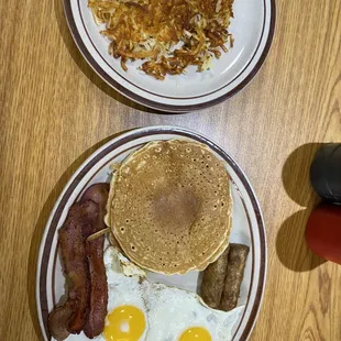 two plates of breakfast food