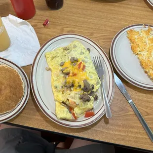 David's Omelet, with sausage instead of ham, pancakes and hasbrowns
