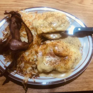 Eggs Benedict with hash browns and a side of bacon. Definitely hit the spot!