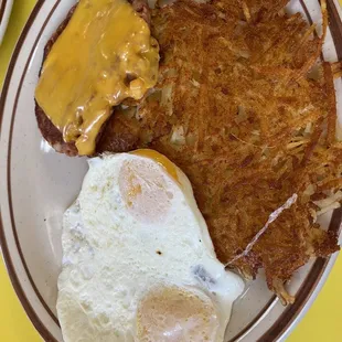 Delicious corned beef hash with eggs over easy