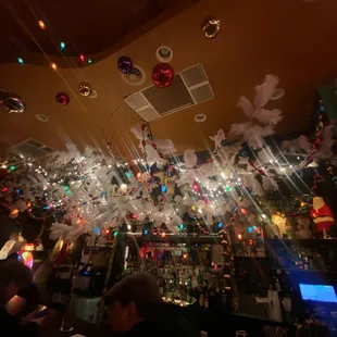 christmas decorations hanging from the ceiling