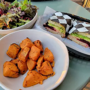Veggie Sandwich with side salad and side of sweet potatoes