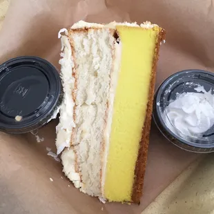 a piece of cake and two cups of coffee