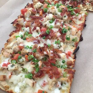 a slice of pizza in a box