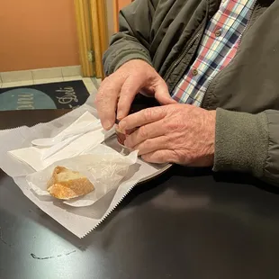 a man eating a donut