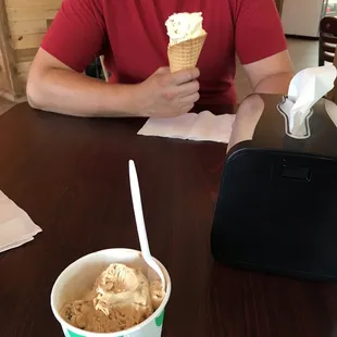 a man eating an ice cream cone