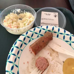Great slaw and brat - homemade! You can get it on a bun. Husband had shredded BBQ chicken sandwich and added some of my slaw to it...yummm