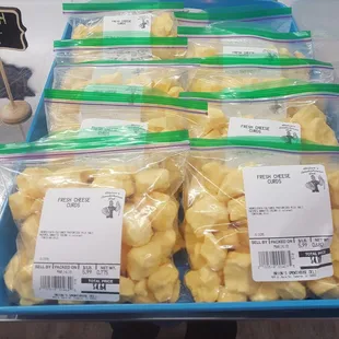 a display of bagged potatoes