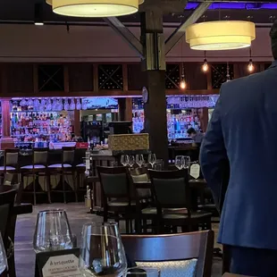 a man standing in a restaurant