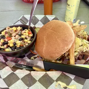 Beef brisket sandwich (with "Cleveland" toppings) and a side of bean and corn salsa