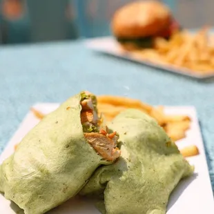 a burrito and french fries