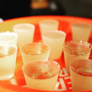 a tray of shot glasses on a table