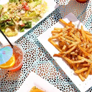 three plates of food on a table