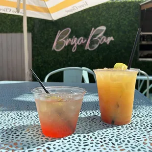 two drinks sitting on a table