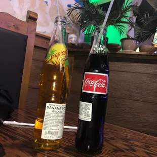 Bottle coke and banana soda.
