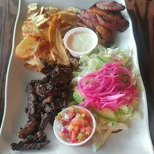 The fried plantain chips and the sauce were my favorite part. Everything was amazing though.