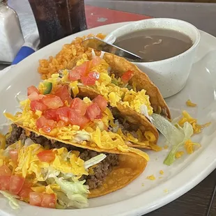 Three ground beef tacos served with Charro beans and rice. YUMMY!