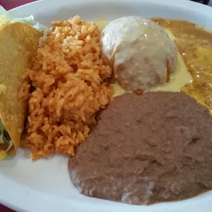 Isabel plate: taco, cheese enchilada,  rice,  beans and queso puff. Meh. Taco was pretty good.