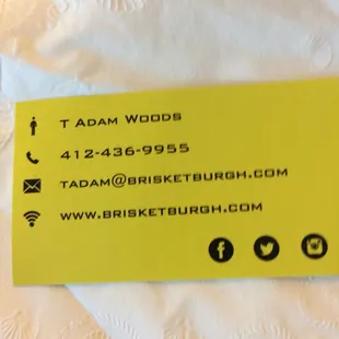a business card on a bed