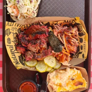 Brisket, pulled pork, loaded mash and coleslaw.