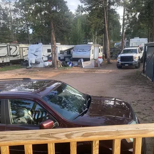 Trailers, directly in front of cabin