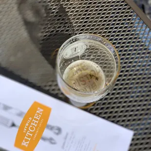 a glass of beer on a table