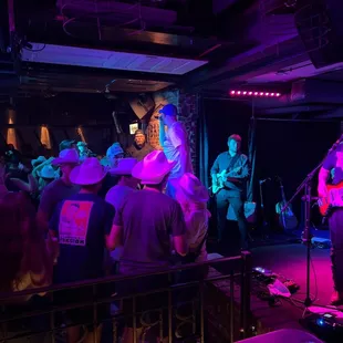 a band performing at a bar