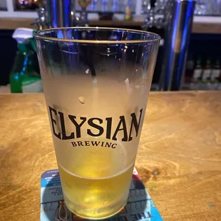 a glass of elyian brewing