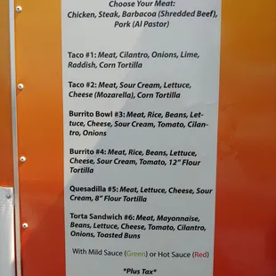 a menu on a food truck