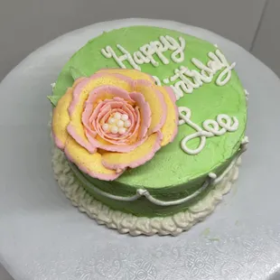 Lemon cake with lemon curd and a beautiful buttercream flower