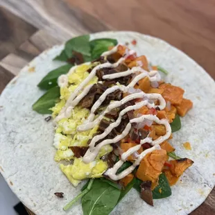 Beautiful sweet potato burrito from our breakfast menu. Served all day!