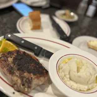 Smokey molasses glazed pork chop with garlic mashed potatoes