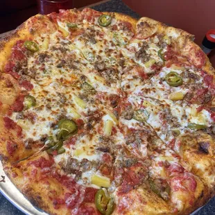 Build your own with sausage, jalapeño, and pineapple