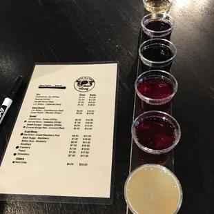 Flight of wine and cider.