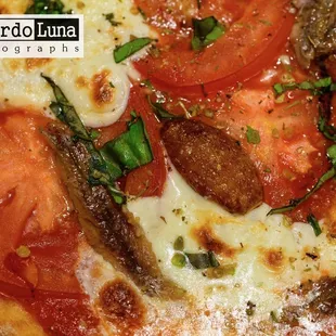 The Greatest photographer of Tampa Bay was here. Eating excellent pizza is a must. Anchovies and roasted garlic included. Enjoy