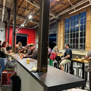 a large group of people sitting at tables