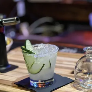 a cocktail with cucumber