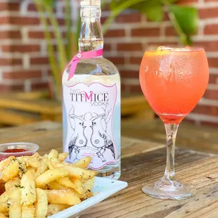 Locally owned, Two Titmice Vodka supports local women with breast cancer.