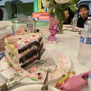 10 inch heart shaped, chocolate, tres leches, with custard and strawberry filling